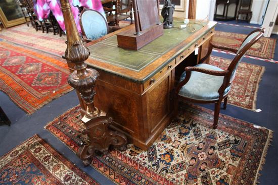 A Victorian brass bound pollard oak partners desk, W.5ft 3in. D.3ft H.2ft 6in.